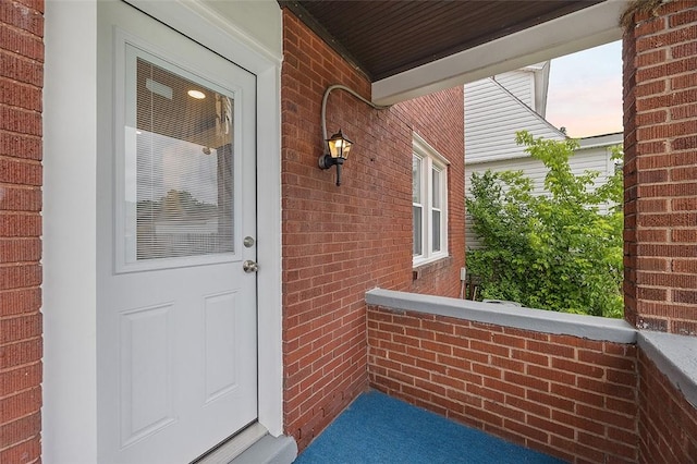 1014 Fordham Ave, Brookline, PA 15226 - view of exterior entry featuring brick siding and a porch