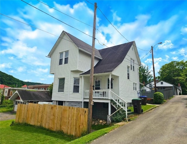 12311/2 Otter St, City Of Franklin, PA 16323 - traditional home featuring covered porch and stairway
