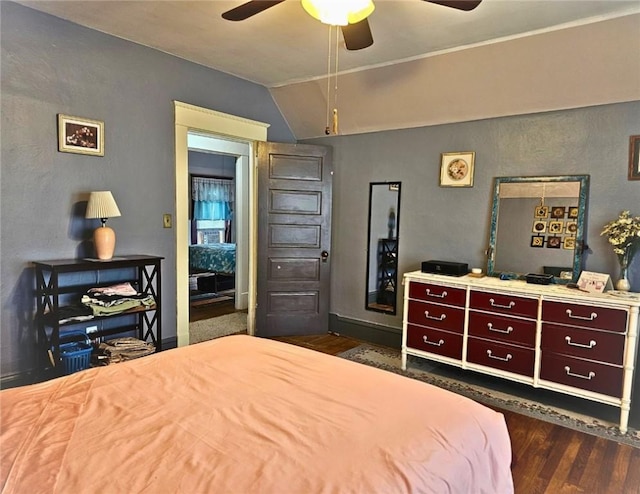 12311/2 Otter St, City Of Franklin, PA 16323 - bedroom featuring dark wood finished floors, vaulted ceiling, and a ceiling fan