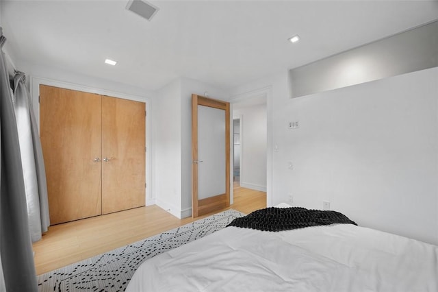 1821 Merriman, South Side, PA 15203 - bedroom with light wood-style flooring, a closet, and recessed lighting