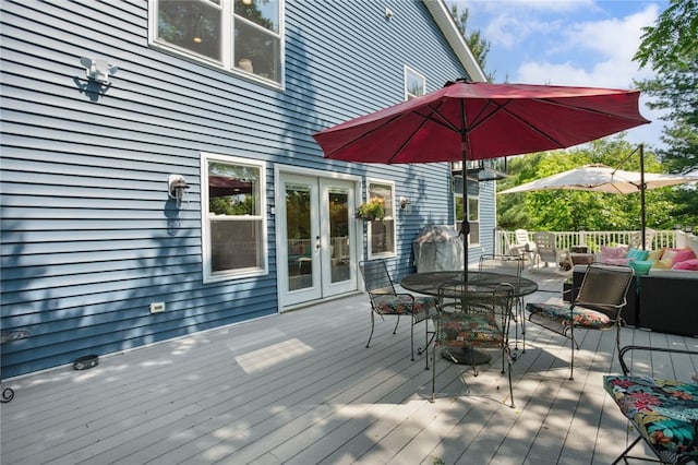 812 Franklin Rd, Pine Twp Nal, PA 16046 - wooden deck with french doors, outdoor dining space, and an outdoor hangout area