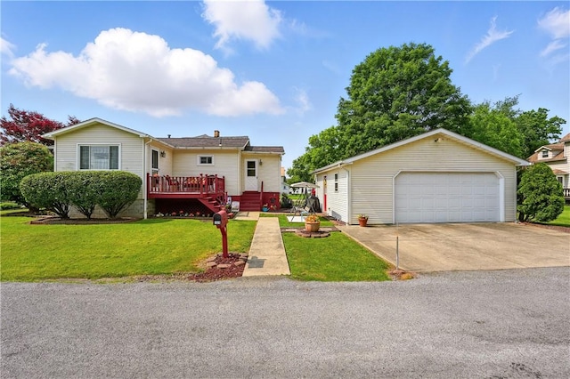 1029 N Water Ave, Hermitage, PA 16148 - view of front of home with a detached garage, a front yard, and a deck