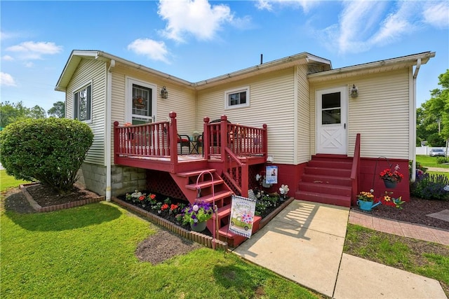 1029 N Water Ave, Hermitage, PA 16148 - back of house with a deck, a lawn, and entry steps