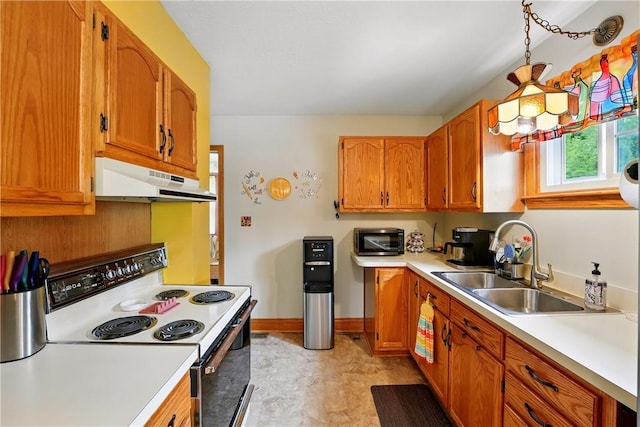 1029 N Water Ave, Hermitage, PA 16148 - kitchen with electric range, under cabinet range hood, light countertops, and brown cabinetry