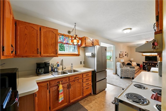 1029 N Water Ave, Hermitage, PA 16148 - kitchen with range with electric cooktop, freestanding refrigerator, open floor plan, light countertops, and light floors