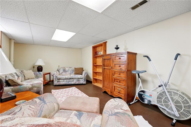 1029 N Water Ave, Hermitage, PA 16148 - living room featuring a drop ceiling and concrete floors