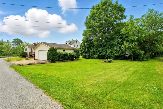 1029 N Water Ave, Hermitage, PA 16148 - view of front of home with driveway, a front yard, and an attached garage