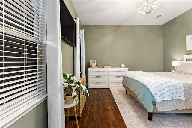 4002 Saint Andrews Ct, Penn Twp Wml, PA 15644 - bedroom featuring wood finished floors and a chandelier
