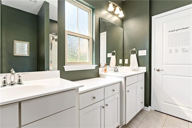 4002 Saint Andrews Ct, Penn Twp Wml, PA 15644 - bathroom with two vanities and tile patterned flooring