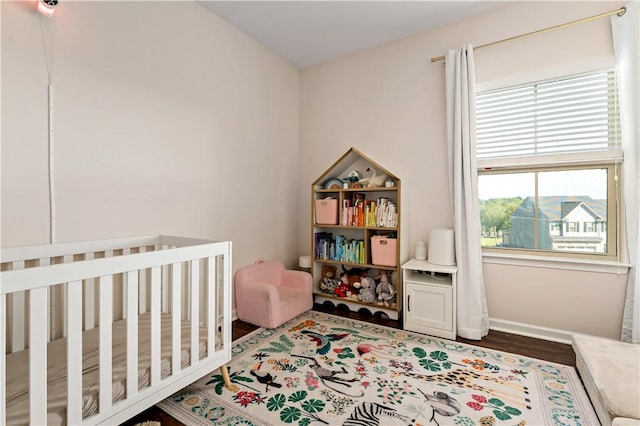 4002 Saint Andrews Ct, Penn Twp Wml, PA 15644 - bedroom featuring wood finished floors and a crib