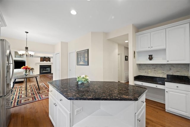 7052 Bennington Woods Dr, Mccandless, PA 15237 - kitchen featuring freestanding refrigerator, dark wood-style flooring, open shelves, tasteful backsplash, and recessed lighting