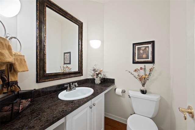 7052 Bennington Woods Dr, Mccandless, PA 15237 - half bathroom with vanity and wood finished floors