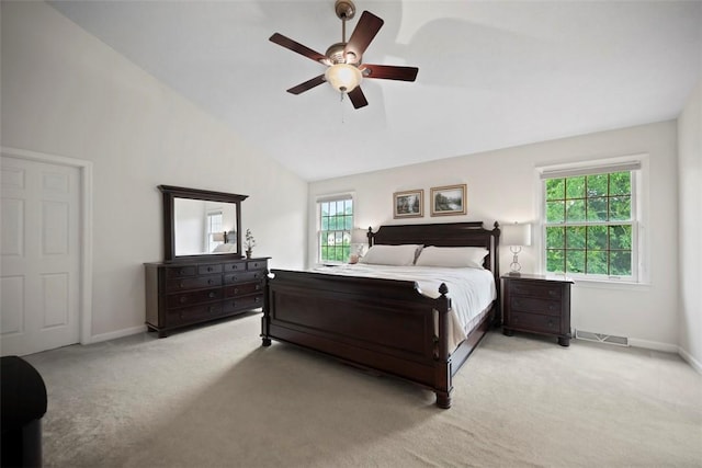 7052 Bennington Woods Dr, Mccandless, PA 15237 - bedroom with light colored carpet, vaulted ceiling, and a ceiling fan