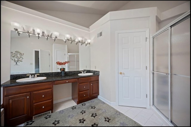 7052 Bennington Woods Dr, Mccandless, PA 15237 - full bath with tile patterned flooring, a shower stall, double vanity, and vaulted ceiling