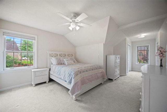 7052 Bennington Woods Dr, Mccandless, PA 15237 - bedroom with light carpet, vaulted ceiling, a ceiling fan, and a closet