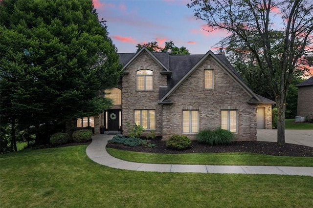 7052 Bennington Woods Dr, Mccandless, PA 15237 - traditional-style home featuring a front lawn, a chimney, concrete driveway, and a garage