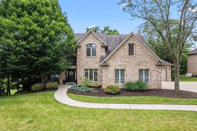 7052 Bennington Woods Dr, Mccandless, PA 15237 - traditional-style house featuring a front yard, driveway, and brick siding