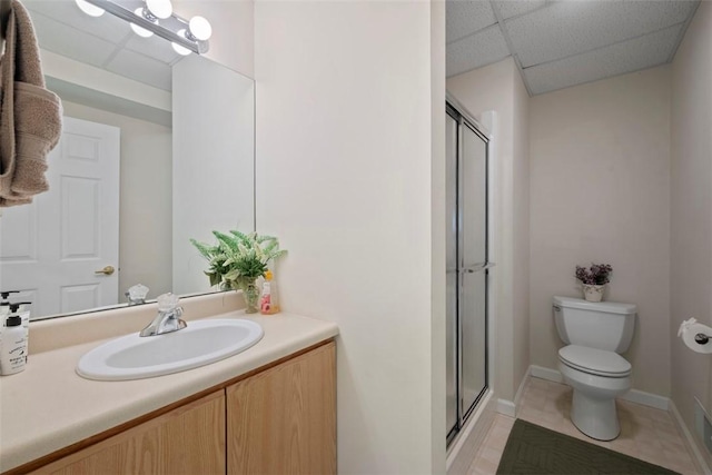 7052 Bennington Woods Dr, Mccandless, PA 15237 - bathroom with a paneled ceiling, a stall shower, vanity, and tile patterned flooring