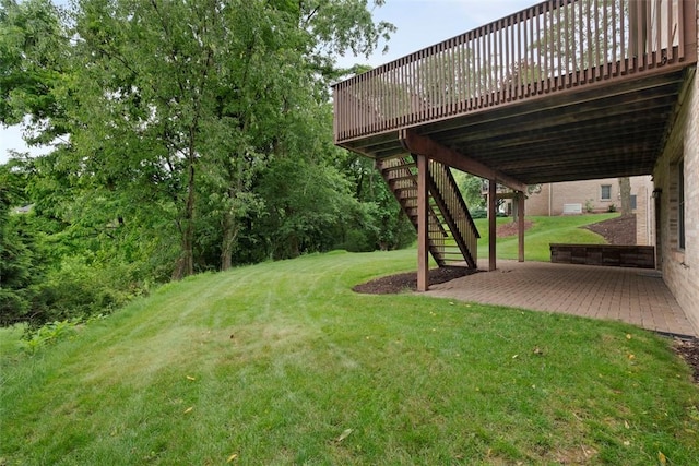 7052 Bennington Woods Dr, Mccandless, PA 15237 - view of green lawn with stairs, a wooden deck, and a patio