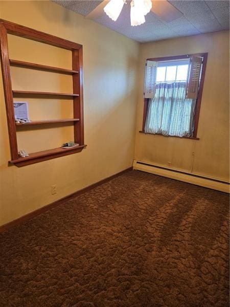 192 Crowe Ave, Mars Boro, PA 16046 - spare room with a ceiling fan, a baseboard radiator, and dark carpet