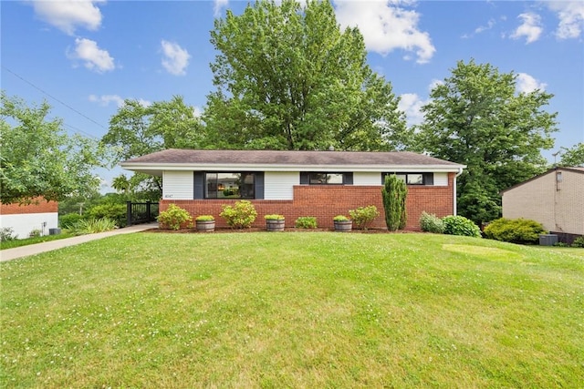 4047 Crestwood Dr, West Deer, PA 15044 - view of front of home with brick siding and a front yard