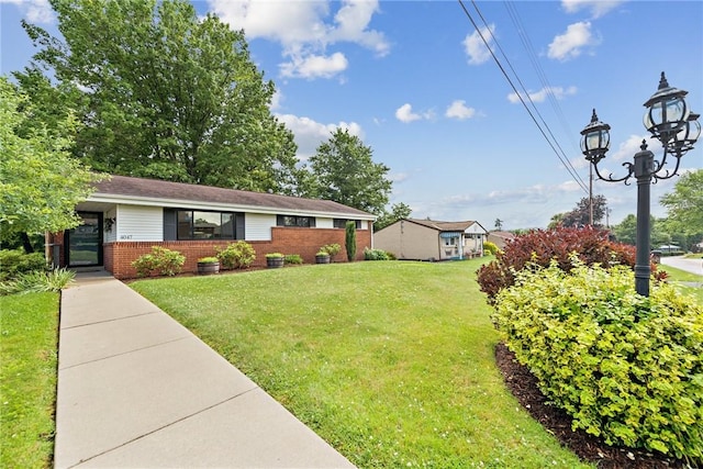 4047 Crestwood Dr, West Deer, PA 15044 - view of front of home featuring brick siding and a front lawn