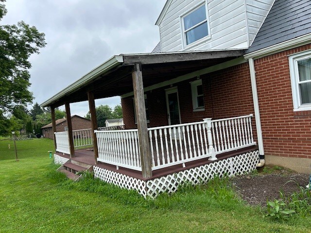 300 6th Ave, New Eagle, PA 15067 - porch featuring a yard