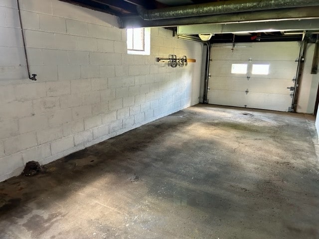 300 6th Ave, New Eagle, PA 15067 - garage featuring concrete block wall