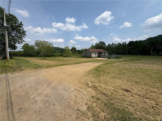 114 Cardinal Rd, Canoe/Banks Twps, PA 15742 - view of front of home featuring dirt driveway, a rural view, and a front yard