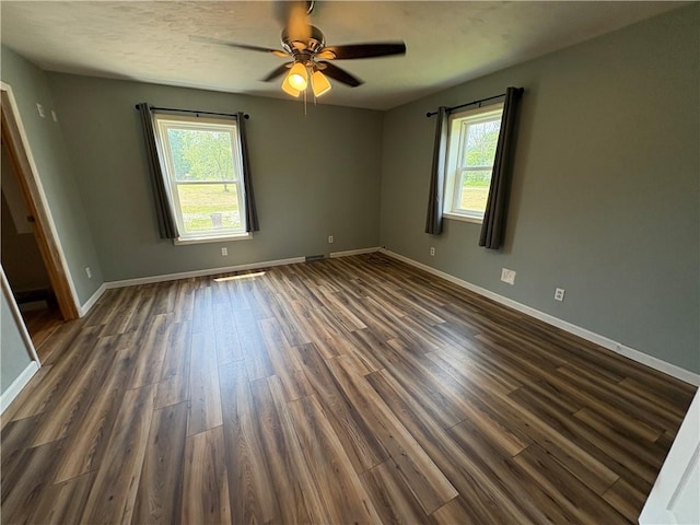 114 Cardinal Rd, Canoe/Banks Twps, PA 15742 - unfurnished room with healthy amount of natural light, dark wood-style flooring, and a ceiling fan