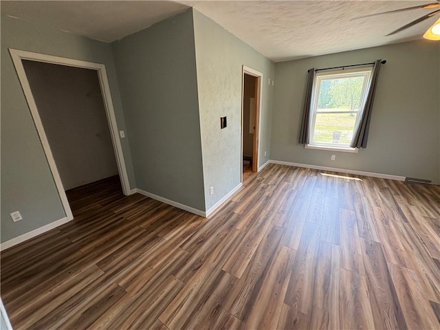 114 Cardinal Rd, Canoe/Banks Twps, PA 15742 - empty room featuring dark wood-style floors, ceiling fan, and a textured ceiling