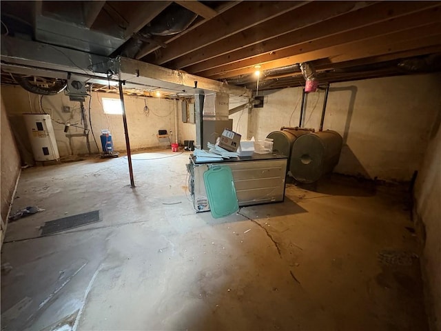 114 Cardinal Rd, Canoe/Banks Twps, PA 15742 - unfinished basement with water heater, oil tank, a water pressure tank, and heating unit
