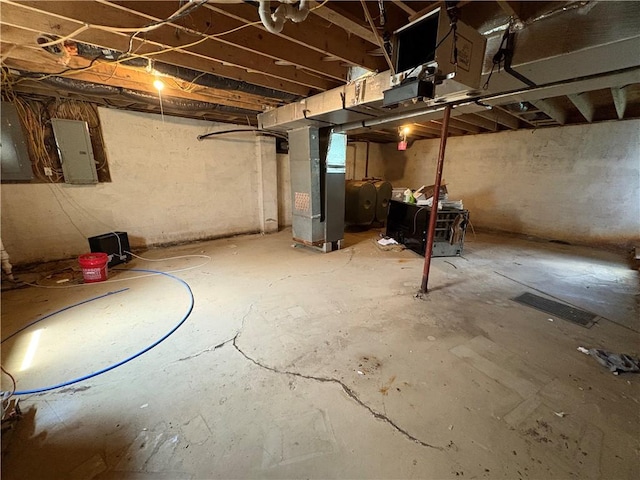 114 Cardinal Rd, Canoe/Banks Twps, PA 15742 - unfinished basement featuring heating unit and electric panel