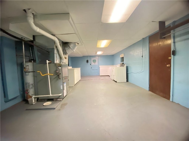 371 Leech Rd, Sugar Grove Twp, PA 16125 - below grade area with separate washer and dryer, strapped water heater, heating unit, and concrete block wall
