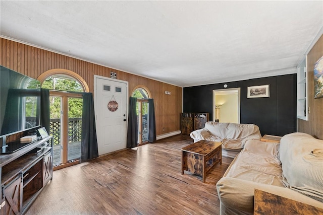 119 Taylor Rd, Quemahoning Twp, PA 15541 - living room with wooden walls, wood finished floors, and ornamental molding