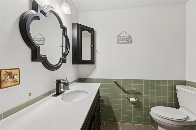 119 Taylor Rd, Quemahoning Twp, PA 15541 - bathroom with tile patterned flooring, tile walls, vanity, and a wainscoted wall