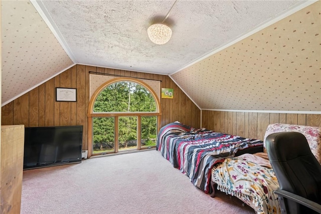 119 Taylor Rd, Quemahoning Twp, PA 15541 - bedroom with a textured ceiling, carpet, wooden walls, and lofted ceiling