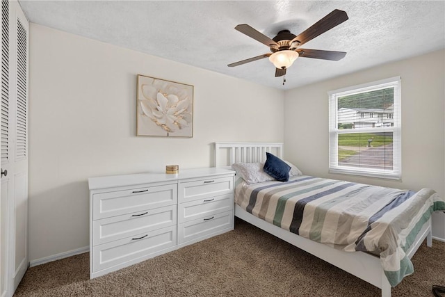 1304 Greenhill Road Ext, Shaler, PA 15209 - bedroom featuring dark carpet, a closet, a textured ceiling, and ceiling fan