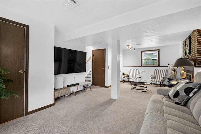 1304 Greenhill Road Ext, Shaler, PA 15209 - living room featuring carpet, stairs, and a textured ceiling