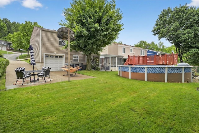 1304 Greenhill Road Ext, Shaler, PA 15209 - view of green lawn with an attached garage, an outdoor pool, a deck, a sunroom, and driveway
