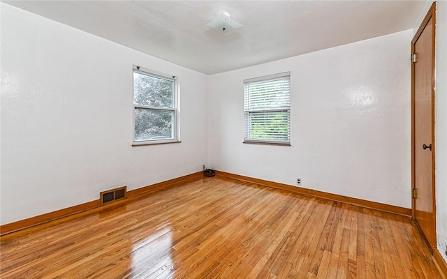 9916 Neuhart Blvd, Mccandless, PA 15090 - empty room with light wood-style flooring and healthy amount of natural light