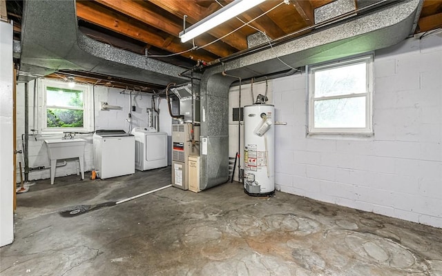 9916 Neuhart Blvd, Mccandless, PA 15090 - below grade area with water heater, washer and dryer, and heating unit