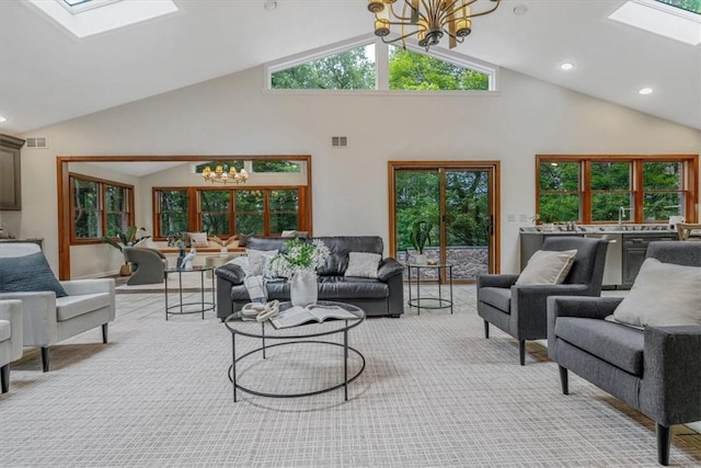 38 Easton Rd, Fox Chapel, PA 15238 - living area featuring a chandelier, a skylight, high vaulted ceiling, light colored carpet, and recessed lighting