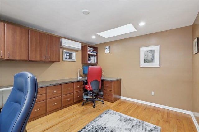 38 Easton Rd, Fox Chapel, PA 15238 - home office featuring a wall mounted AC, light wood-style floors, a skylight, and recessed lighting