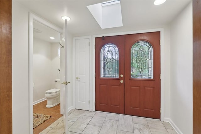38 Easton Rd, Fox Chapel, PA 15238 - foyer entrance with a skylight and baseboards