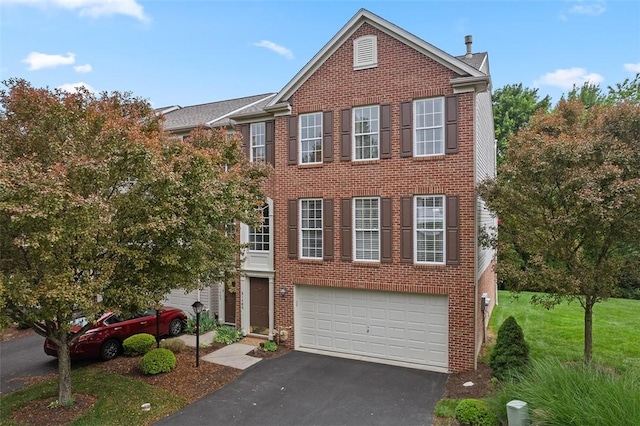 81406 Lost Valley Dr, Adams Twp, PA 16046 - view of front of house featuring driveway, brick siding, a garage, and a front lawn