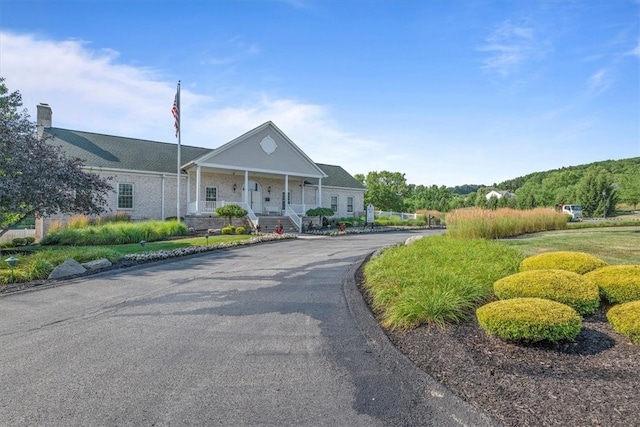 81406 Lost Valley Dr, Adams Twp, PA 16046 - view of front of property featuring covered porch and a chimney