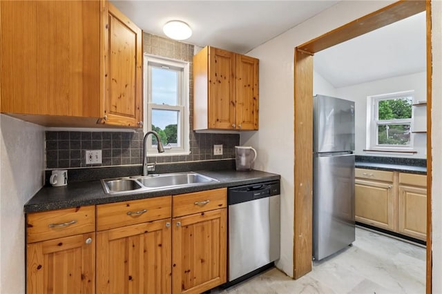 1027 Goldenrod St, Homestead, PA 15120 - kitchen with stainless steel appliances, dark countertops, decorative backsplash, and brown cabinetry