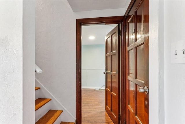 1027 Goldenrod St, Homestead, PA 15120 - staircase featuring wood finished floors and a textured wall