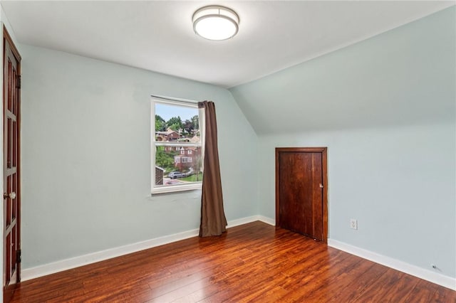 1027 Goldenrod St, Homestead, PA 15120 - additional living space with dark wood-type flooring and vaulted ceiling